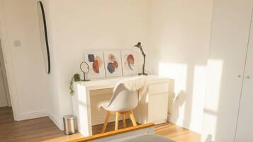 2 bedrooms, desk, iron/ironing board, travel crib