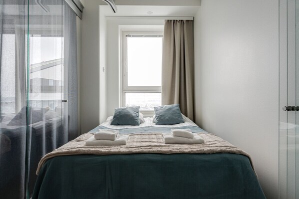 1 bedroom, desk, iron/ironing board, travel crib