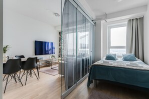 1 bedroom, desk, iron/ironing board, travel cot