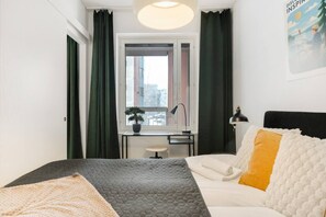 1 bedroom, desk, iron/ironing board, travel cot