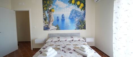 2 slaapkamers, een strijkplank/strijkijzer, reisbedje, gratis wifi