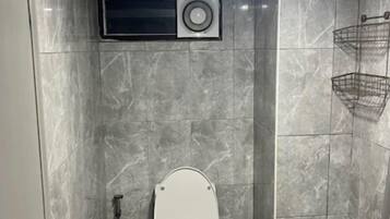 Shower, bidet, towels, soap