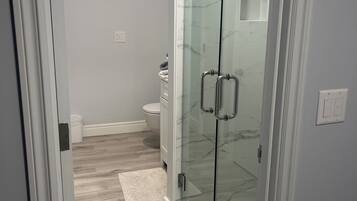 Hair dryer, towels, soap, toilet paper