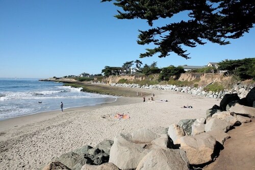 Designer Inspired Beach Cottage, One Short Block from an Expansive Beach