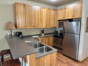 Unclassified image, 5 of 21, button - SUITE 104 by Eagle Waters Resort (eagle river)