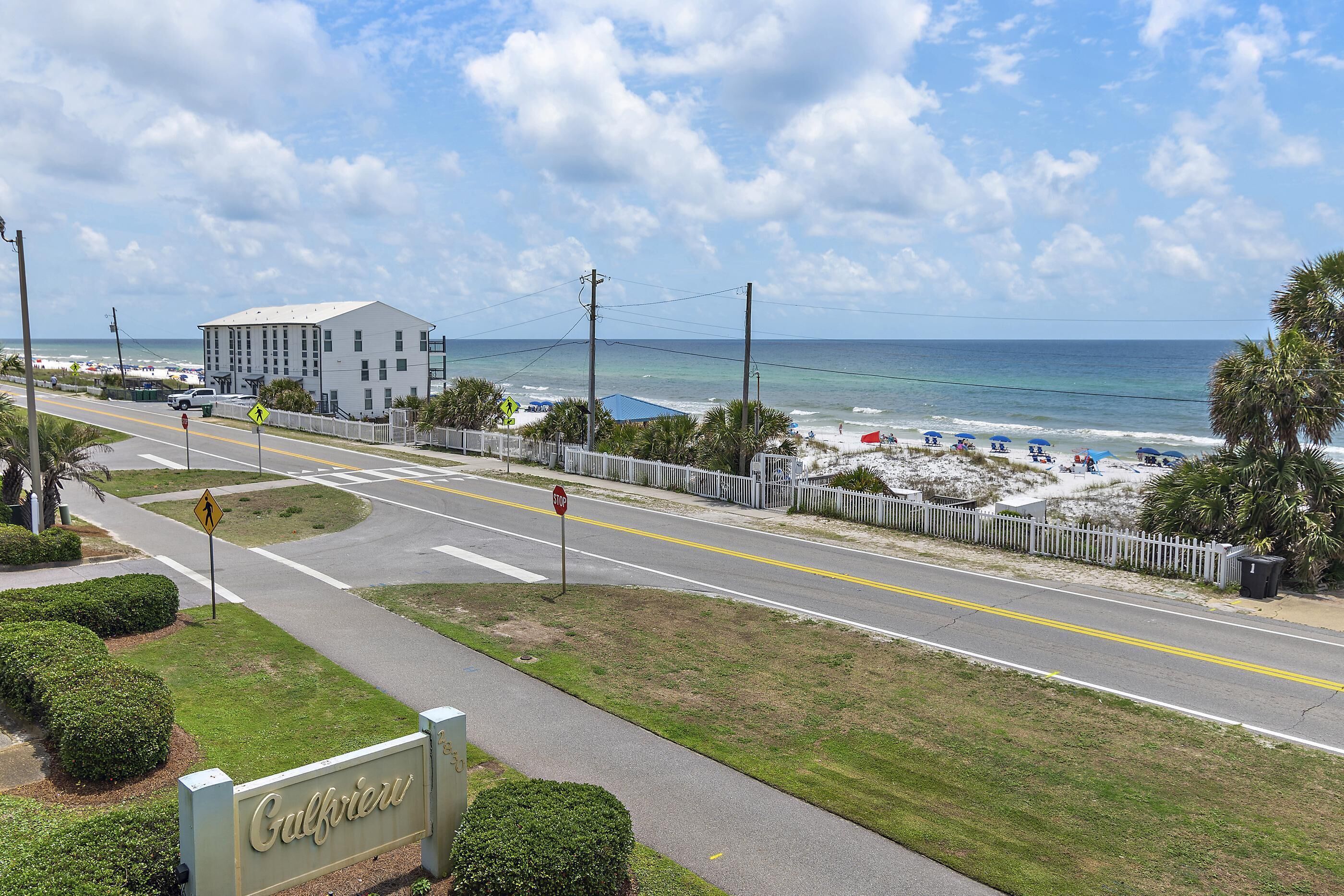 A road leading to a building with a sign reading "Gulfview."