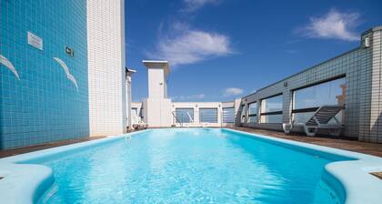 Apto c Churrasq Piscina e Wi-fi a 200m da Praia