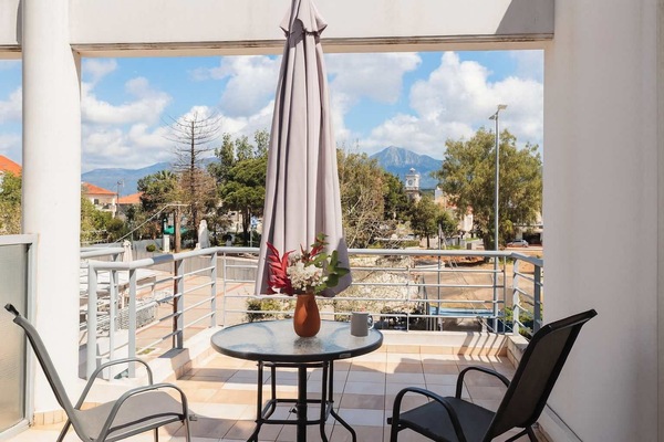 Shaded Balcony Corner – Relax with a Drink or Book