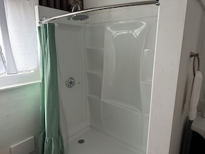 Shower, hair dryer, soap, shampoo