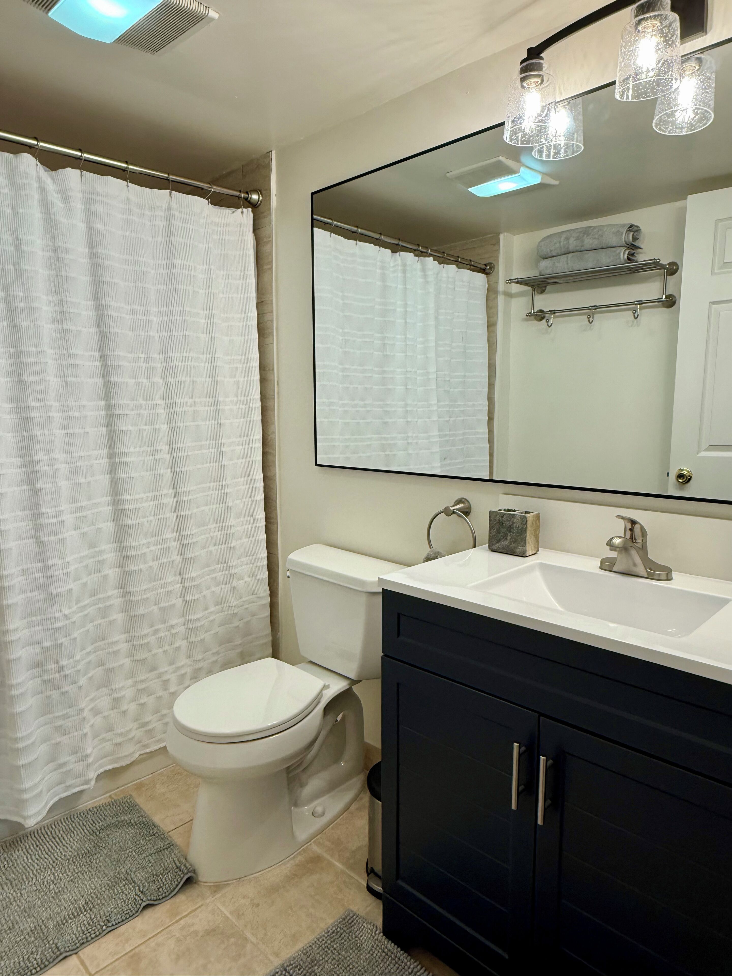 Hair dryer, towels, soap, shampoo