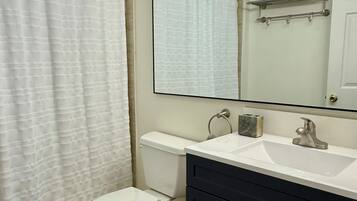 Hair dryer, towels, soap, shampoo