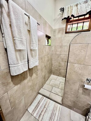 Shower, hair dryer, towels, soap
