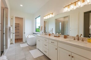 Shower, hair dryer, towels, toilet paper