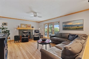 Smart TV, fireplace, books, printers