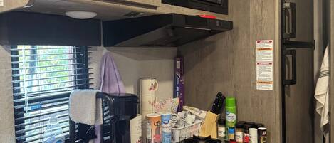Fridge, microwave, stovetop, coffee/tea maker