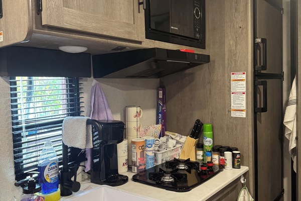 Fridge, microwave, stovetop, coffee/tea maker