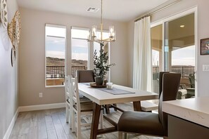 Enjoy meals in this dining area with a view of the surrounding mountains.