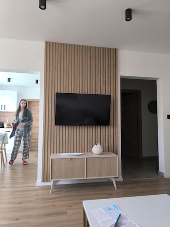 Flat-screen TV. Hron River Apartmnet