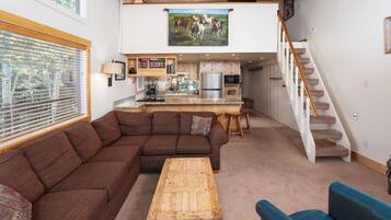 Televisión, chimenea, estéreo