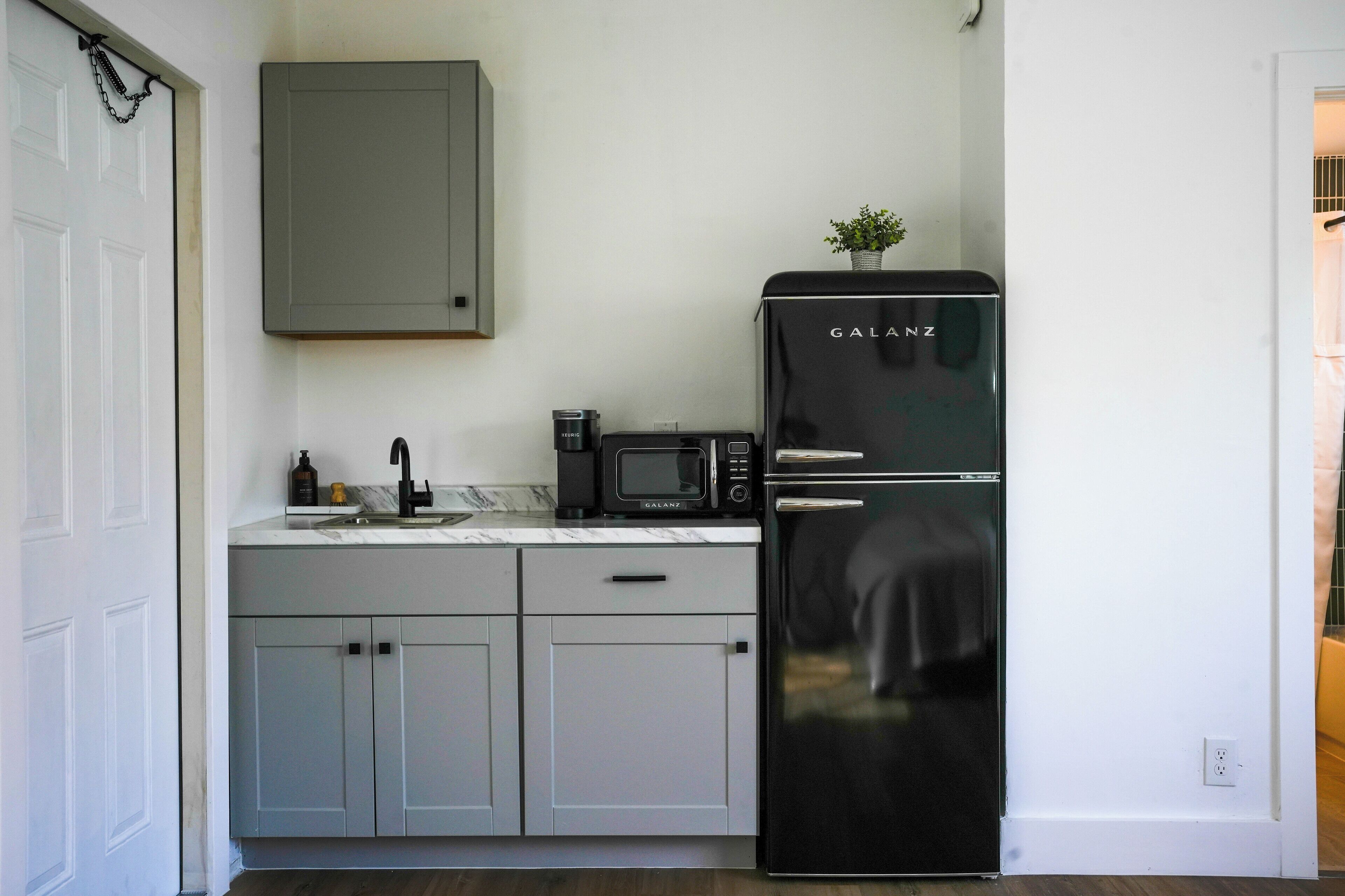 Fridge, microwave, stovetop, cookware/dishes/utensils