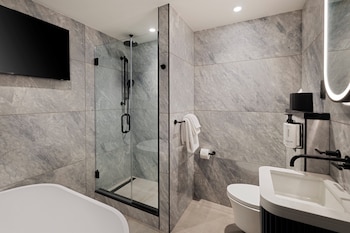 Suite, 1 Bedroom (Times Square View) | Bathroom | Eco-friendly toiletries, towels at voco Times Square - Broadway by IHG