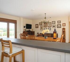 Deluxe suite, uitzicht op golfbaan | Woonruimte