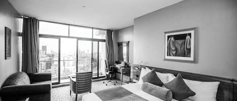 Junior Double Room, City View | Down comforters, memory foam beds, desk, laptop workspace