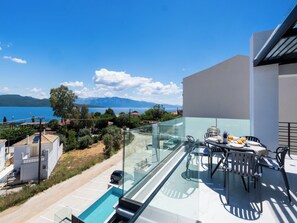 Dúplex Deluxe, vista al mar | Terraza o patio