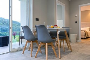 Deluxe Apartment, River View | Terrace/patio