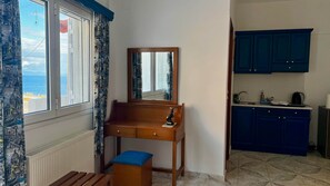 Fridge, stovetop, coffee/tea maker, cookware/dishes/utensils