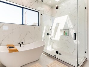 Shower, hair dryer, towels, soap