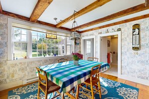 Dining - Charming Seaside Cottage with a Gas Fireplace, Spacious Patio, and Nearby Hiking (Hancock)