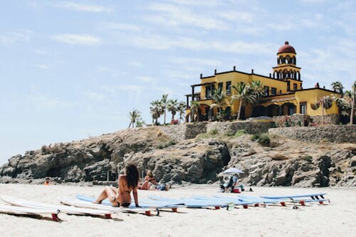 First floor oceanview condo w/ two private patios steps to the main beach at Playa Cerritos. Modern 2-bedroom home, a 1-minute walk to the beach, perfect for families or couples looking for quiet luxury and reliable Wi-Fi.