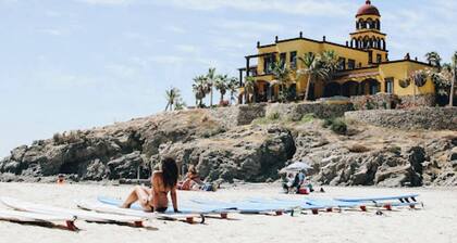 First floor oceanview condo w/ two private patios steps to the main beach at Playa Cerritos. Modern 2-bedroom home, a 1-minute walk to the beach, perfect for families or couples looking for quiet luxury and reliable Wi-Fi.