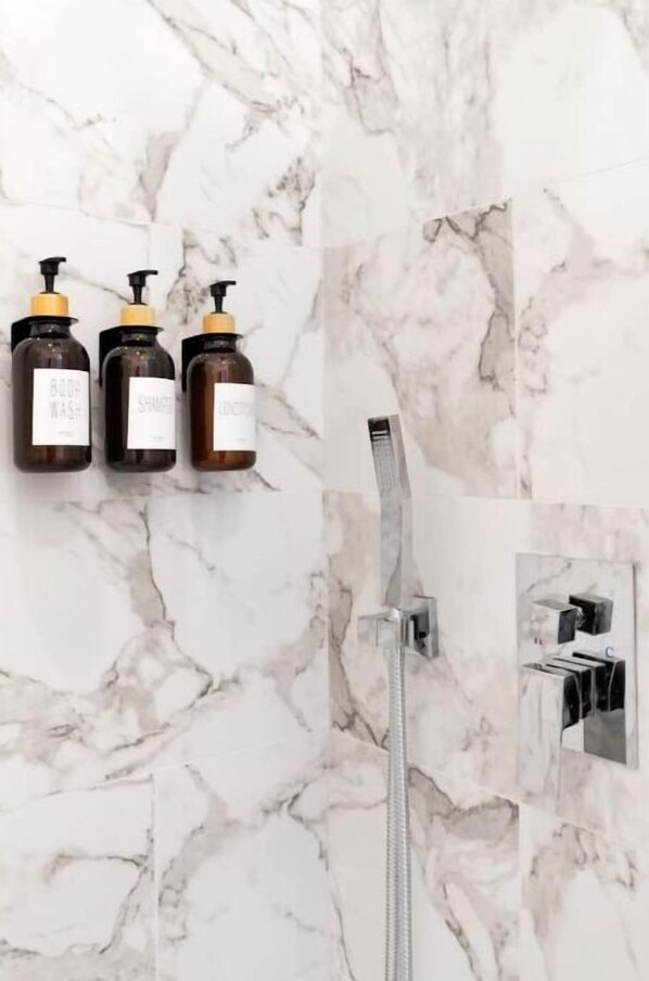 Shower, hair dryer, towels, soap