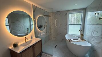 Shower, towels, soap, toilet paper