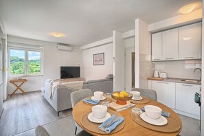 Apartment, Balcony, Hill View | Living area | 55-inch LCD TV with cable channels - Adriatic Retreat Meje 4 min to the beach (Split)