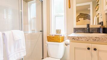 Shower, hair dryer, towels, soap
