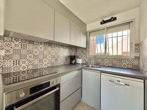 Fridge, microwave, oven, cookware/dishes/utensils