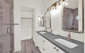 Shower, towels, soap, toilet paper