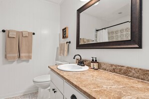 Hair dryer, towels, soap, shampoo