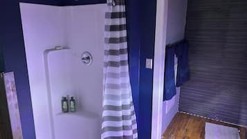 Shower, towels, soap, toilet paper