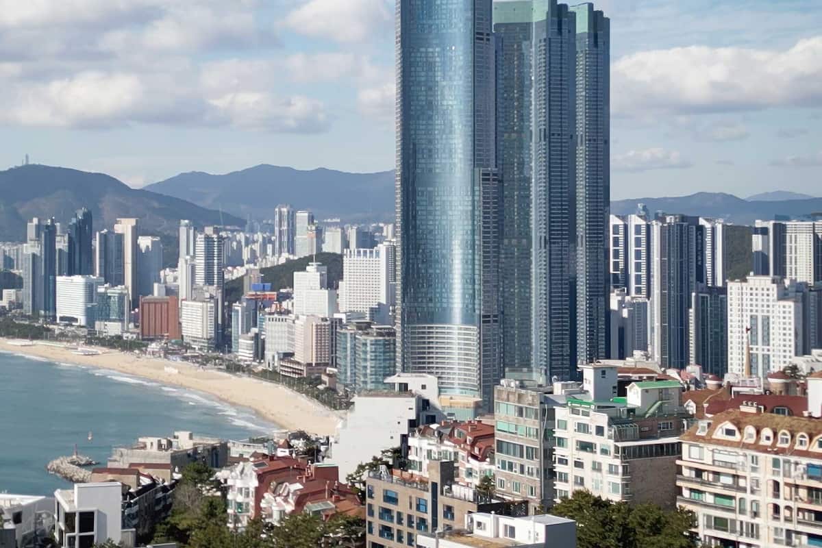 Ocean Premier Suite | Living area | 70-inch Smart TV with cable channels