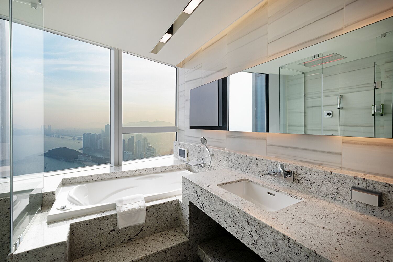 Ocean Executive Suite | Bathroom | Hair dryer, slippers, bidet, towels