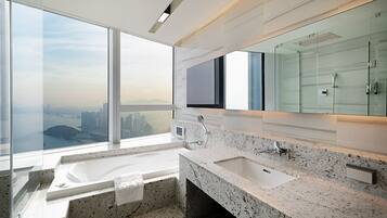 Ocean Executive Suite | Bathroom | Hair dryer, slippers, bidet, towels