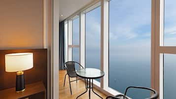 Ocean Par La Suite | Living area | 70-inch Smart TV with cable channels