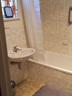 Hair dryer, towels, soap, toilet paper