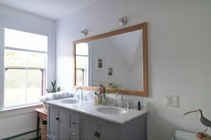 Shower, eco-friendly toiletries, hair dryer, towels