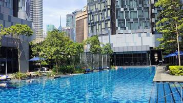 3 outdoor pools, open 6:30 AM to 10:00 PM, pool umbrellas