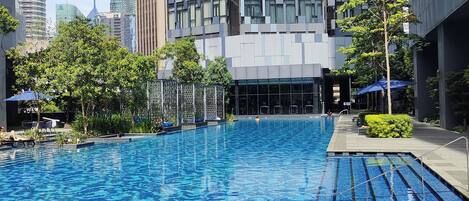 3 outdoor pools, open 6:30 AM to 10:00 PM, pool umbrellas